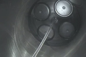 A borescopic inspection showing the internal components and early signs of wear in a CAT yacht engine.