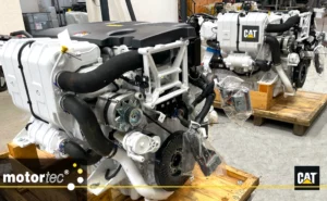 Two Caterpillar generators on display at a Motortec stand.